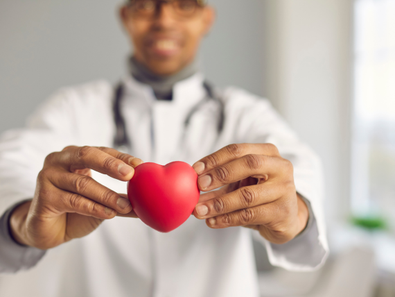 Doctor holding a prop heart