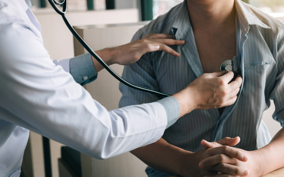 Doctor Using Stethoscope to Check a Patient's Breathing and Heart